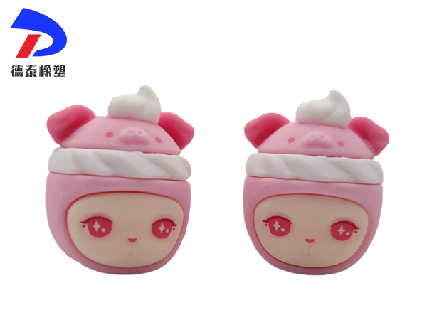 What are the steps in the production process of silicone doll keychains?